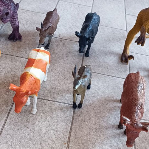 Lot of 12 assorted animal and dinosaur figures