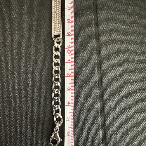Silver identity bracelet with rhinestones, curb chain, without one rhinestone, 17-18 cm