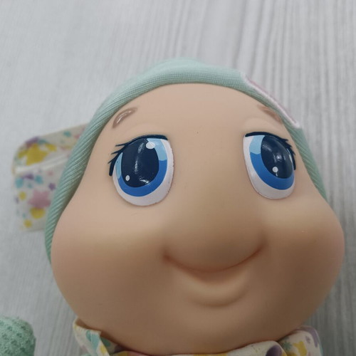 Light-up Huggy toy from the 1990s, fabric stains
