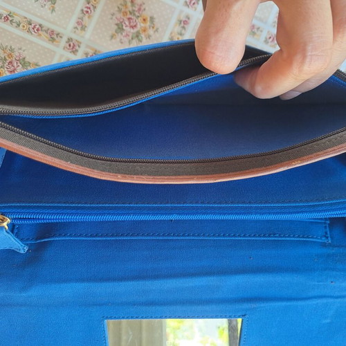Large striped clutch bag used, blue and brown