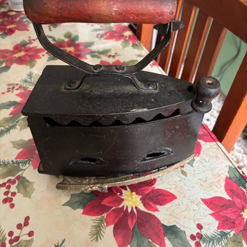 Iron with base and charcoal used