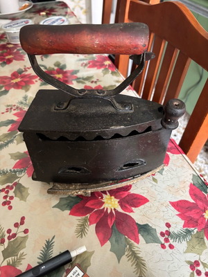 Iron with base and charcoal used