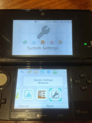 Nintendo 3DS console with charger, memory card and stylus