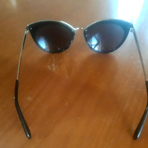 Rebecca Blu sunglasses used, black gold butterfly shape