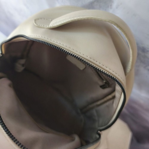 David Jones backpack used, beige with embossed design