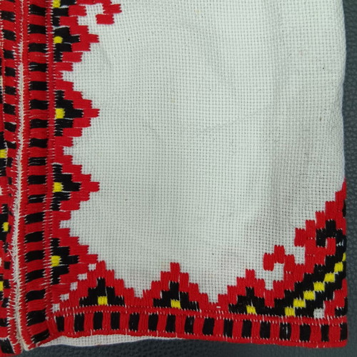 Collectible traditional fabric with embroidered pattern No 114 used