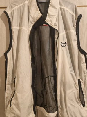 Sergio Tacchini men's sleeveless windbreaker like new, large, white