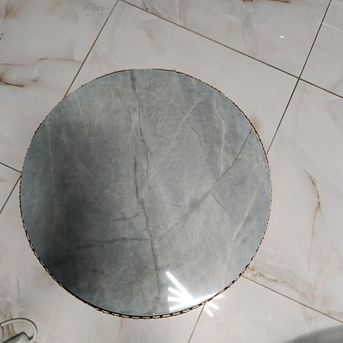 Vintage round coffee table with metal decoration and marble top like new