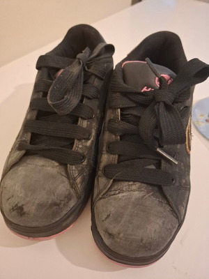 Heelys authentic athletic shoes with wheels used, size 39