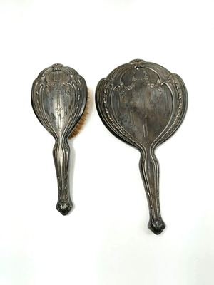 Silver-plated brush and mirror set with carved flowers like new