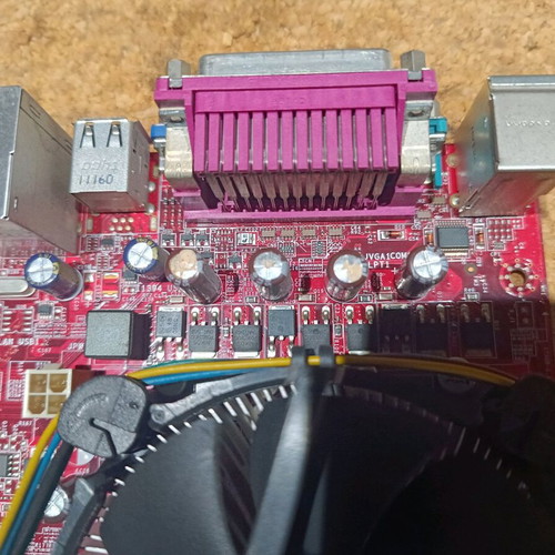 MSI G31M3-F motherboard used with Intel processor and heatsink