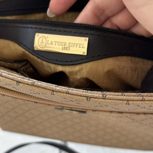 La tour Eiffel crossbody bag like new, black and beige