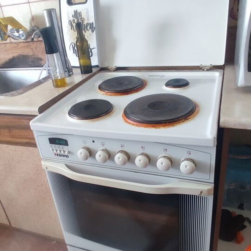 Eskimo electric stove used with electronic timer and illuminated switches
