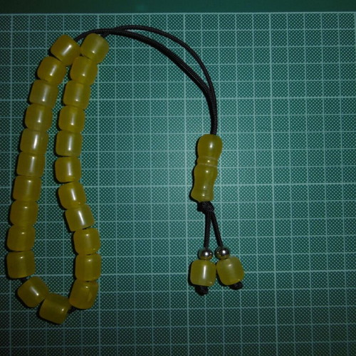 Handmade komboloi with yellow acrylic beads