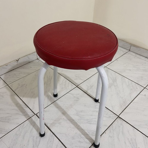 Stool with metal legs and red seat like new