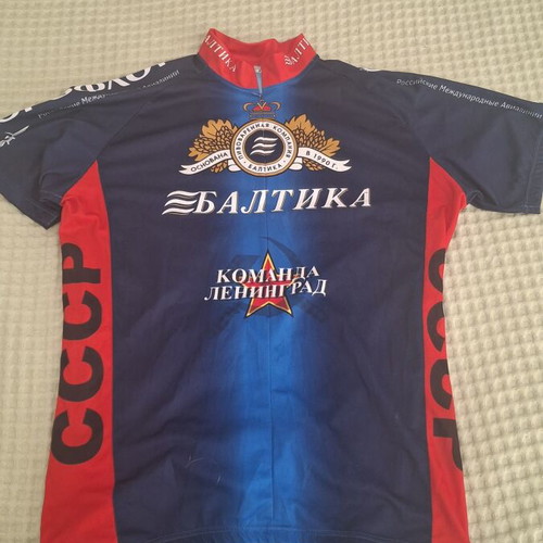 Men's cycling jersey large like new with large neck zipper and 3 back pockets