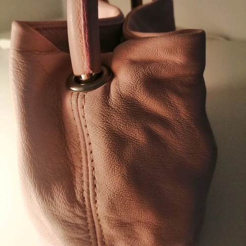 Rollini leather wrist bag new, pink color