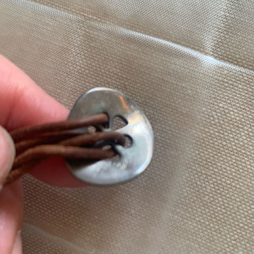 Silver craft elements set with eye and stone