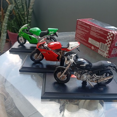 Collectible Motorcycle Miniatures like new with display bases