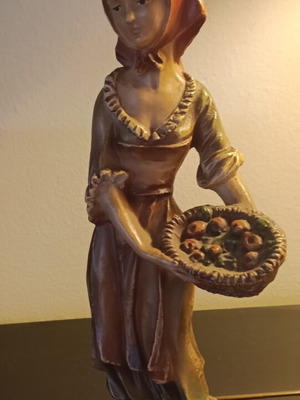 Vintage decorative figurine used, young peasant girl with fruit basket