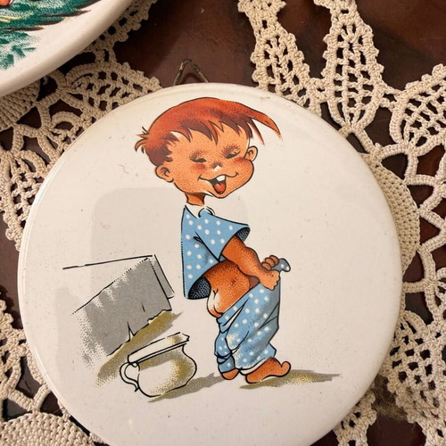 Ceramic vintage plates with children's figures used