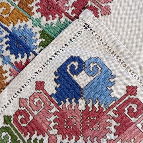 Handmade table runner used, traditional colorful geometric embroidery