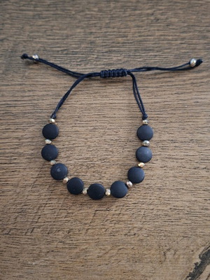Bracelet with adjustable opening like new, black and gold