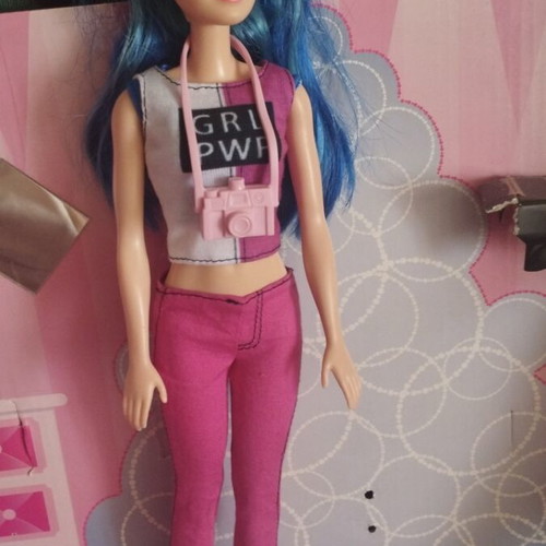 Barbie doll with blue hair