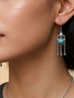 Handmade earrings made of 925 silver and semi-precious turquoise stones
