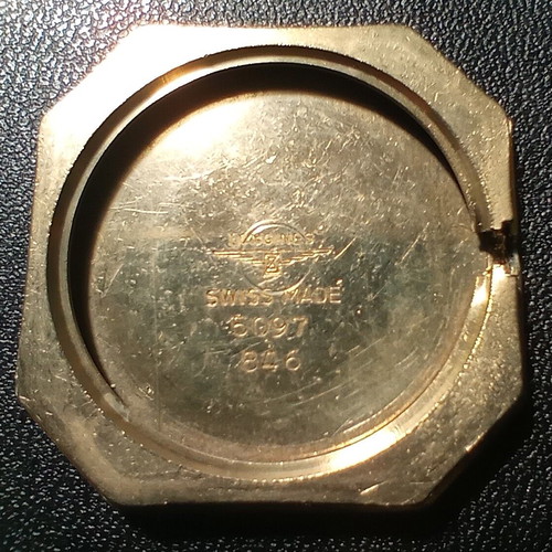 Vintage Longines Octagon watch from the 1970s like new, gold and black