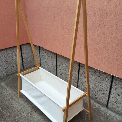 Bamboo clothes rack with cotton fabric basket