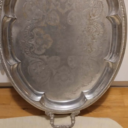 Silver-plated serving tray used with ornate handles