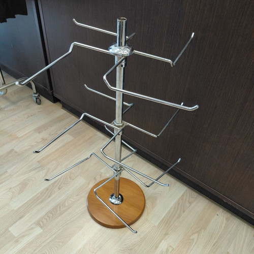 Metal three-tier countertop stand used with wooden base