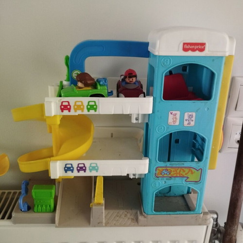 Fisher Price garage toy used with 2 figures