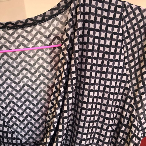 Draped dress used with geometric pattern in black and gray