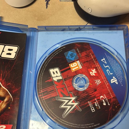 PS4 bundle NBA 2K22 and WWE 2K18 games