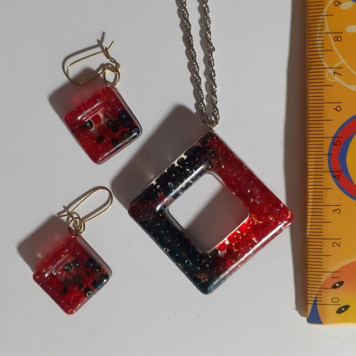 Two sets of handmade pendants and earrings, multicolor