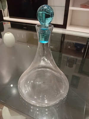 Glass carafe with turquoise spherical stopper, used