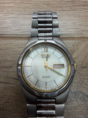Seiko SQ100 ρολόι μεταχειρισμένο, ασημί καντράν, vintage 1980s, 35mm