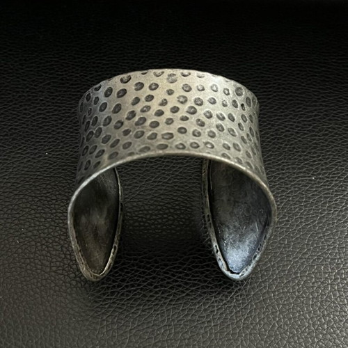 Hammered metal bracelet, silver color