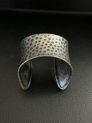 Hammered metal bracelet, silver color