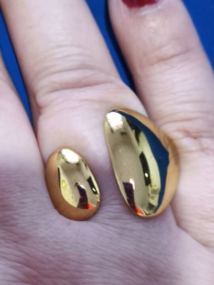 Ring in gold color new, surgical steel