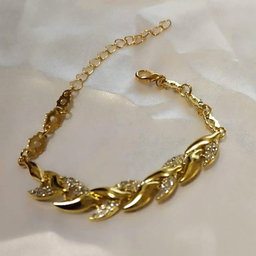 Bracelet shiny with multiple leaves in gold tone new