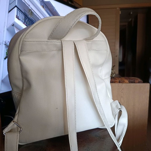 White backpack with front zipper, almost like new