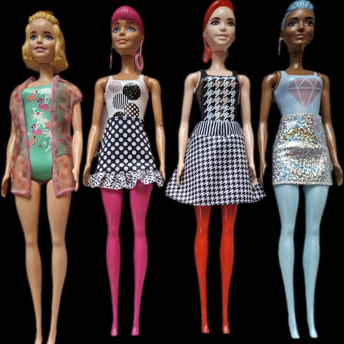 Lot of four dolls like new
