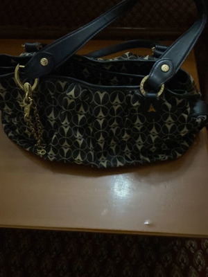 La tour Eiffel shoulder bag like new with monogram design black and beige