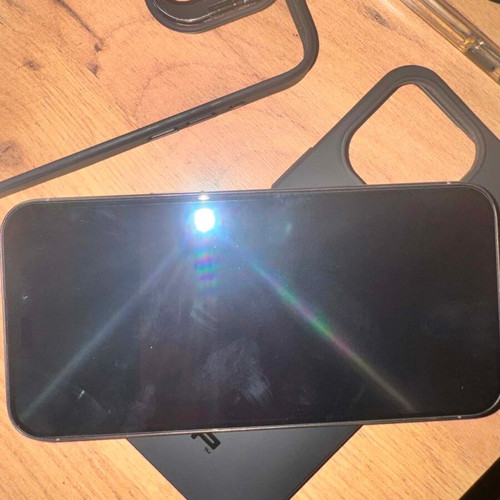 I Phone 15 Pro Max used with many cases and new earphones
