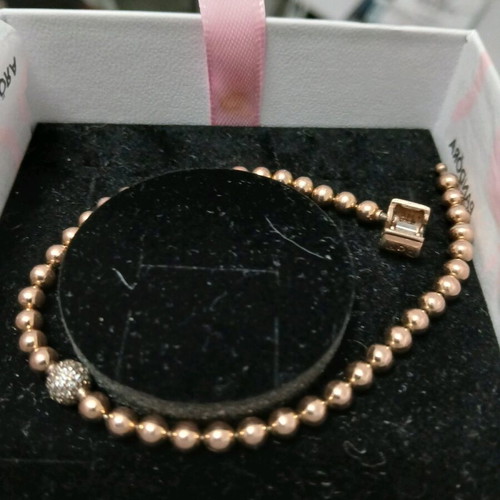 Pandora bracelet with 14K rose gold plating like new with zirconia