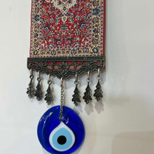 Vintage handmade wall amulet with oriental rug and glass eye 32x10