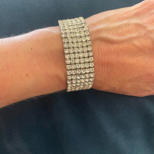 Bracelet with Crystals like new, silver color, elastic and sparkling